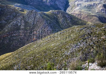 Shadows Of Clouds Over A Massive Mountain Range - Somerset West, Western Cape, South Africa.