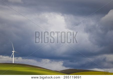 Dramatic Thunderstorm Over Wind Turbine In Green Fields - Caledon, Western Cape, South Africa.
