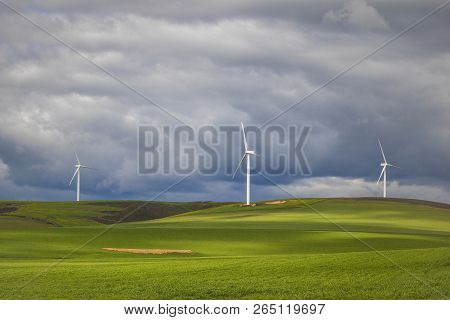 Dramatic Thunderstorm Over Wind Turbines In Green Fields - Caledon, Western Cape, South Africa.