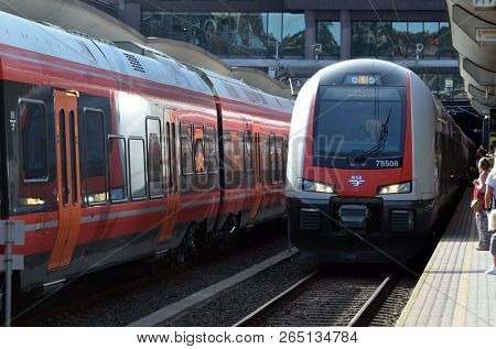 Platform and train view on Oslo central station. Oslo Central Station (Sentralstasjon) is main railway station in Oslo. June 17. 2018. Oslo,Norway