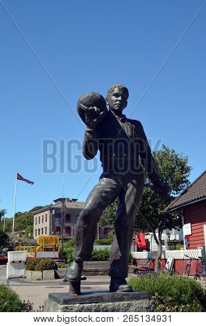 Sculpture of sailor. Marina of the Norwegian fishing town Hvaler . June 19,2018. Hvaler,Norway