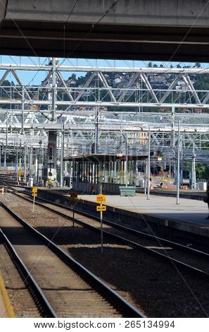 Platform and train view on Oslo central station. Oslo Central Station (Sentralstasjon) is main railway station in Oslo. June 17. 2018. Oslo,Norway