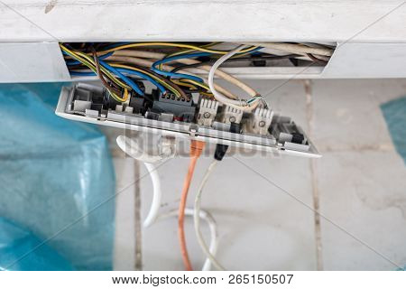 Plactic  Cable Channel While  Repairing  With Electrical Outlets On  Where Two Ethernet Cables And O