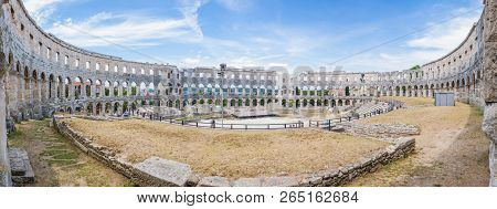 Pula, Croatia - June 18, 2014: Super Wide Angle Inside Panorama Of Amphitheater Or Pula Arena. The M