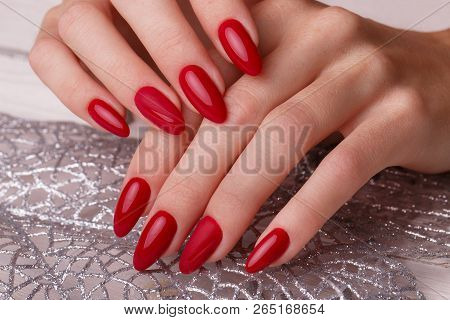 Bright Festive Red Manicure On Female Hands. Nails Design