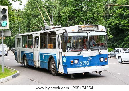 Moscow, Russia - June 2, 2012: Old Blue Trolleybus Ziu 682g In The City Street.