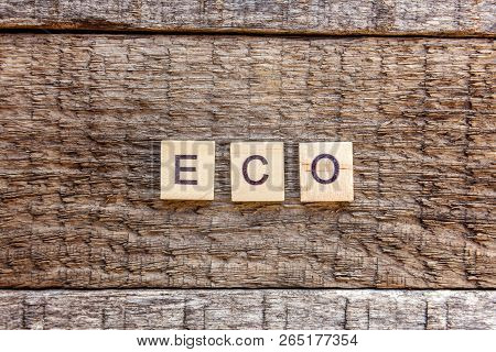 Inscription Eco Letters Word On Old Rustic Wooden Backdrop. Eco Village Abstract Environmental Backg