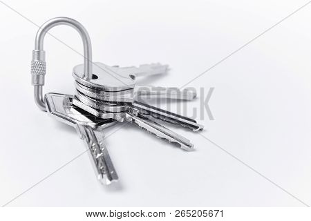Key Ring With Keys Over White Background. Rent, Buy