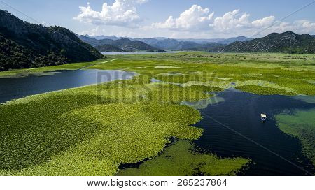 Aerial View Of The Beautiful Landscape Of Lake Skadar In The Mountain On A Sunny Day. Montenegro. Th