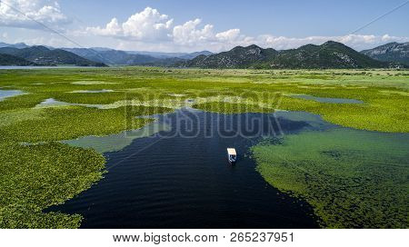 Aerial View Of The Beautiful Landscape Of Lake Skadar In The Mountain On A Sunny Day. Montenegro. Th
