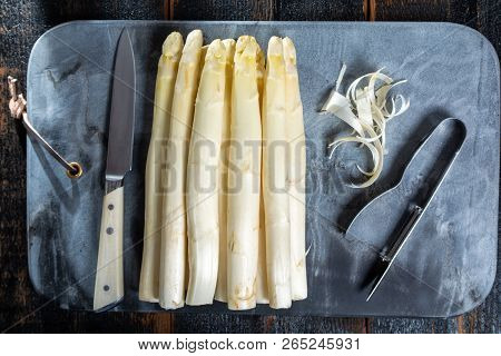 Top View, Fresh Tasty White Asparagus, Seasonal Vegetable, New Harvest, With Piller And Knife, Ready