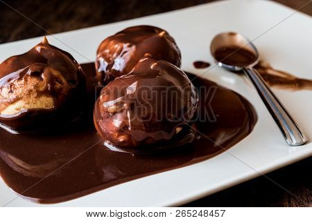 Profiteroles With Chocolate Cream.