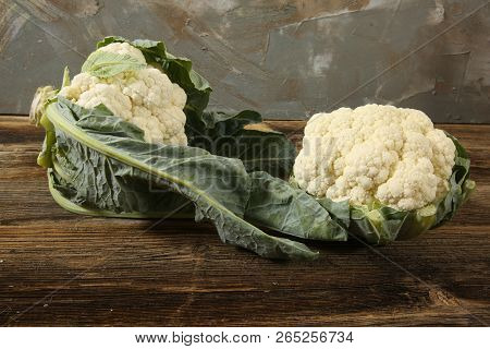Freshly Carnations On Wooden Background. Organig Food