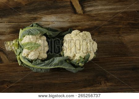 Freshly Carnations On Wooden Background. Organig Food