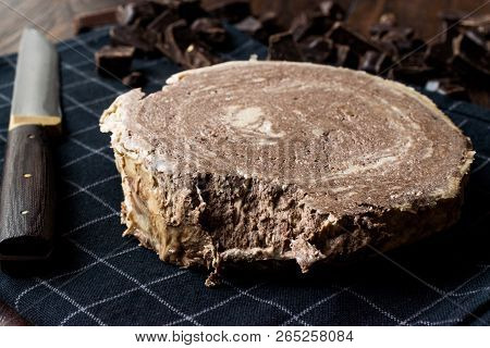 Turkish Chocolate Halva Or Helva With Knife And Chocolate Pieces