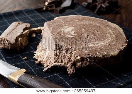 Turkish Chocolate Halva Or Helva With Knife And Chocolate Pieces