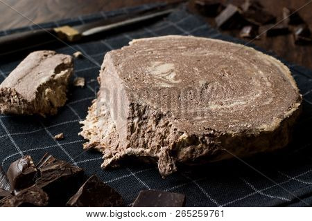 Turkish Chocolate Halva Or Helva With Knife And Chocolate Pieces