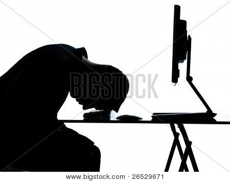 ein caucasian Business Man Computer date Schlaf müde Silhouette im Studio isolated on white 