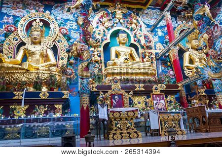 Bylakuppe, Karnataka, India - January 9, 2015: 18 Meters High Statues Inside The Golden Temple - Pad