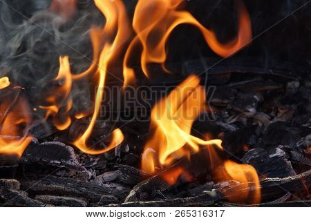 Fire Flame Smoke Embers To Fry On The Street Close-up