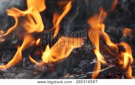 Fire Flame Smoke Embers To Fry On The Street Close-up
