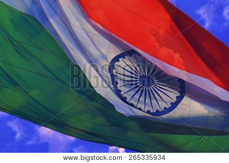 Close Up Of Tiranga , Indian Flag In Blue Sky