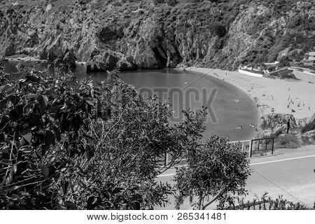 Houcima Beach And Waves And Rocks