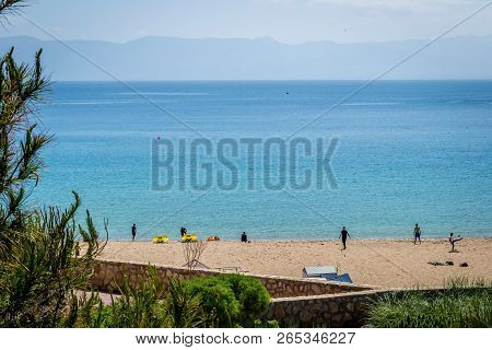 Houcima Beach And Waves And Rocks