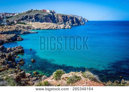 Houcima Beach And Waves And Rocks