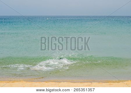 Houcima Beach And Waves And Rocks