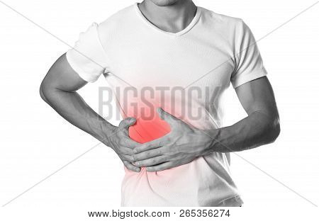 The Man Is Holding His Side. Pain In The Liver. Cirrhosis. The Hearth Is Highlighted In Red. Close U