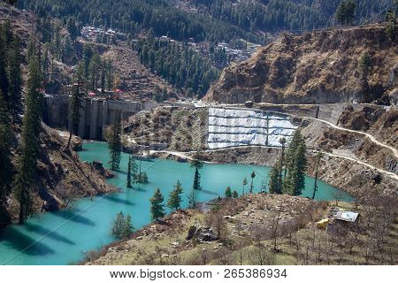 Construction Of Hydroelectric Dam In A Narrow Gorge Of The Sivalik Mountain Range. Concrete Dam. In 