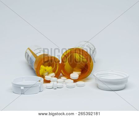 Babylon, New Yorl, Usa - 15 June 2018: Pain Relievers Pills Are Spilling Our Of Two Plastic Pill Bot