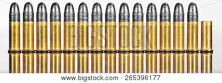 Panorama With Row Of Cartridges Or Ammunition Against White Background, Concepts Such As Business Or