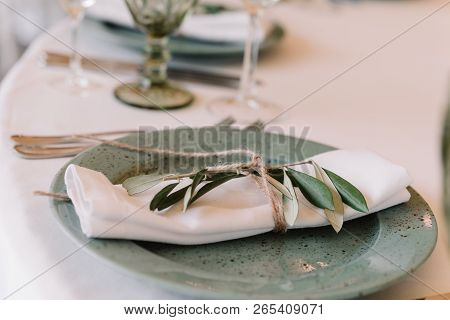 A Cloth On A Banquet Table And Beautiful Ware For A Lunch