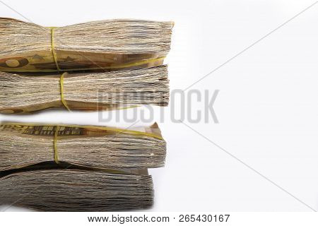 Pile Of 50 Real Euro Notes 50-euro Banknotes Under Rubber Band Isolated On White. About 20000 Euros 