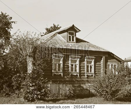 Old Country Log House With Small Dooryard In Vladimir Region, Russia. Monochrome Style.