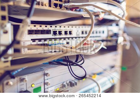 Equipment Of Radio Base Station Close-up, Blue And Yellow Optic Patch Cords, Electrical Rj-45 Patch 