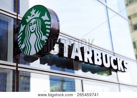 Paris, France - October 16, 2018: Starbucks Coffee Shop Mermaid Logo Is Displayed At The Facade Of A