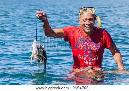Baracoa, Cuba - Feb 5, 2016: Fishermen At The Mouth Of Rio Toa River Near Baracoa, Cuba
