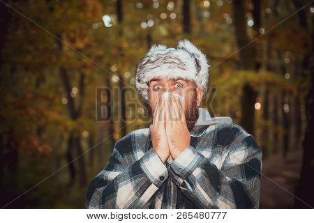 Closeup Portrait Of Young Man In Autumn Clothes With Allergy Or Cold. Man Work Out After He Sick Blo