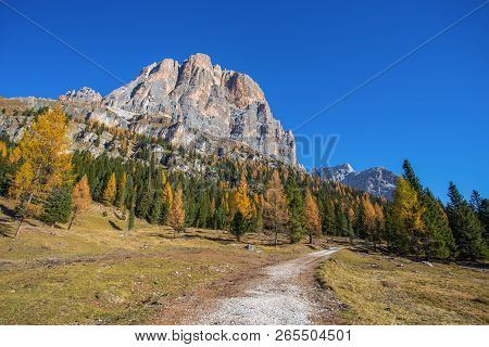 View Of Tofane Mountains On The Background Seen From Falzarego Pass In An Autumn Landscape In Dolomi