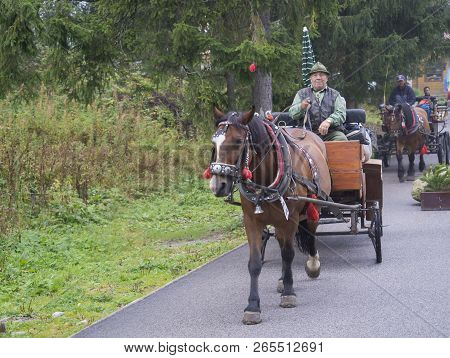 Slovakia, High Tatra Mountain, Strbske Pleso, September 15, 2018: Old Men In Hat With Horse In Tradi