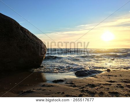 Sunset Over The Sea