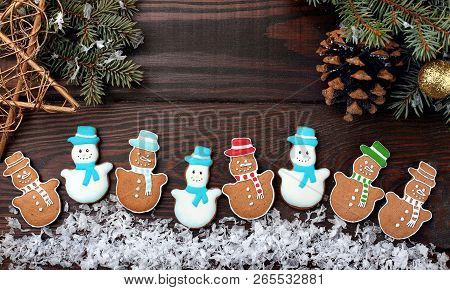 Many Differrent Christmas Homemade Gingerbread Cookies Funny Snowman. On Wooden Table.closeup.top Vi