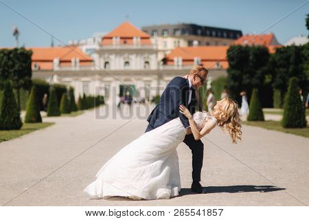Groom Dance With Bride In The Pakr Near The Palace In Wiena, Austria