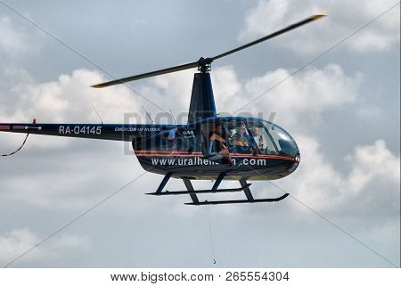 Nizhniy Tagil, Russia - July 12. 2008: Rae Exhibition. Robinson R44 Raven Shows Flying Opportunities