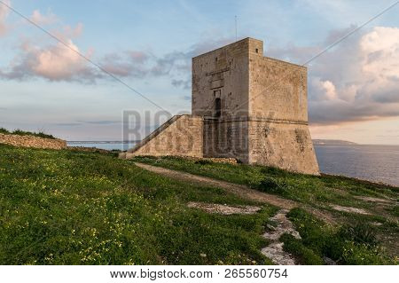 Mgarr Ix-xini Bay Tower Gozo. Malta. Horizontal At Sunset