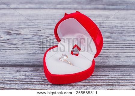 Diamond Ring In A Heart-shaped Box. Jewelry Gift Box In Shape Of Heart With A Golden Ring. Marriage 