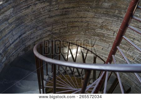 Dark Ancient Stone Spiral Staircase Leading Down